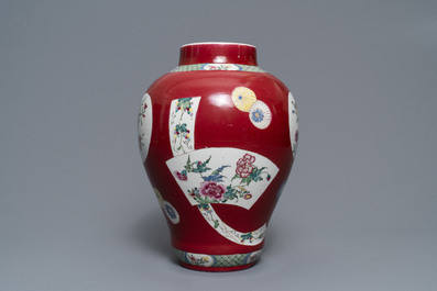 A fine Chinese famille rose ruby ground baluster vase with floral panels, Yongzheng