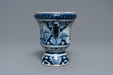 A fine Dutch Delft blue and white 'campana' urn flower pot, 18th C.