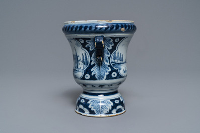 A fine Dutch Delft blue and white 'campana' urn flower pot, 18th C.