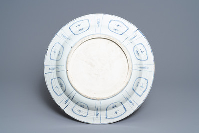A massive Chinese blue and white kraak porcelain charger with a jardini&egrave;re, Wanli