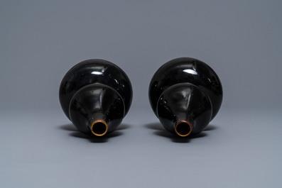 A pair of Chinese dark brown-glazed double gourd vases, Qianlong