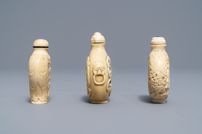 Three Chinese carved ivory snuff bottles, 19th C.