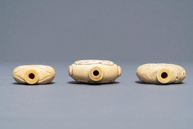 Three Chinese carved ivory snuff bottles, 19th C.