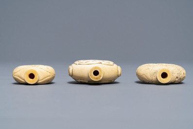Three Chinese carved ivory snuff bottles, 19th C.
