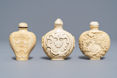 Three Chinese carved ivory snuff bottles, 19th C.