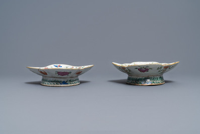 A Chinese blue and white charger and two famille rose bowls, 19th C.