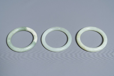 Six Chinese celadon and spinach green jade bangles, 19/20th C.