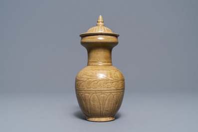 A Chinese brown-glazed vase and cover with incised design, Song