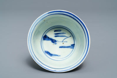 A Chinese blue and white stem cup with landscape design, Transitional period