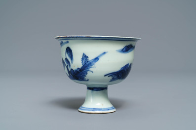 A Chinese blue and white stem cup with landscape design, Transitional period