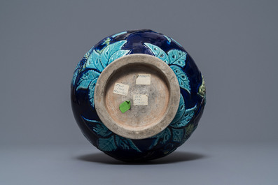 A Chinese fahua relief-decorated vase, 19th C.