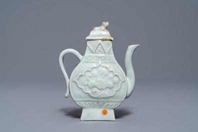 A Chinese qingbai relief-decorated 'phoenix' ewer and cover, Yuan
