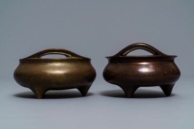 Two Chinese bronze tripod censers, Xuande marks, 19th C.