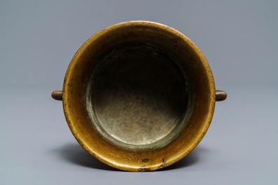 A Chinese bronze tripod censer, Xuande mark, 17/18th C.