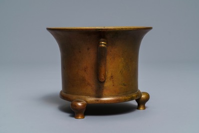 A Chinese bronze tripod censer, Xuande mark, 17/18th C.