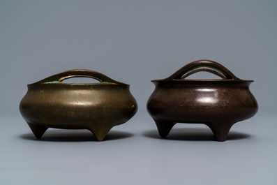 Two Chinese bronze tripod censers, Xuande marks, 19th C.