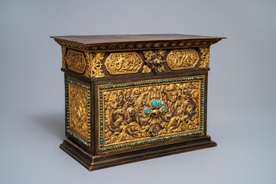 A turquoise-inlaid gilt bronze and copper repouss&eacute; 'tepchog' folding altar table, Tibet, 19th C.