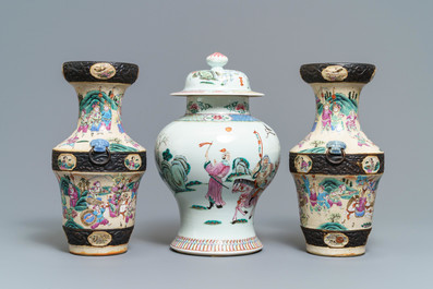 A pair of Chinese famille rose Nanking vases and a covered vase, 19th C.