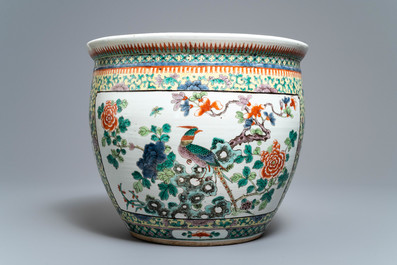 A Chinese famille verte fish bowl with birds among flowers, 19th C.