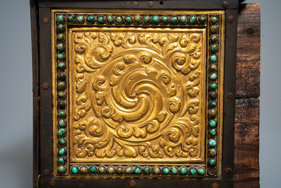 A turquoise-inlaid gilt bronze and copper repouss&eacute; 'tepchog' folding altar table, Tibet, 19th C.