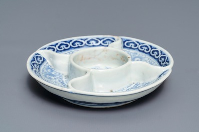A Chinese blue and white spice tray, Qianlong mark, 18/19th C.