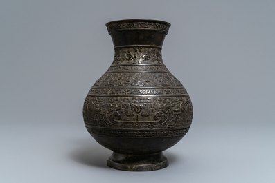 A Chinese archaistic bronze vase, 'hu', Ming