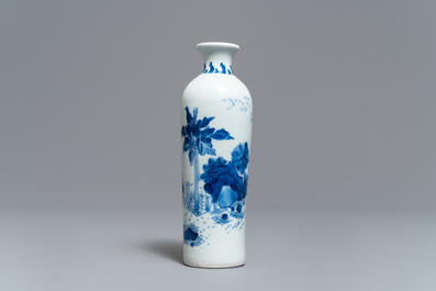 A Chinese blue and white rouleau vase with a figure in a landscape, Transitional period