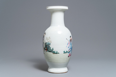 A Chinese famille rose 'immortals' baluster vase, Qianlong mark, 19/20th C.