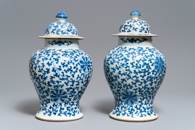 Two pairs of Chinese blue and white vases and covers, Kangxi and Chenghua marks, 19th C.