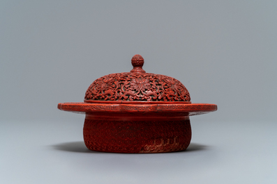 A Chinese cinnabar lacquer box and cover with floral design, 18/19th C.