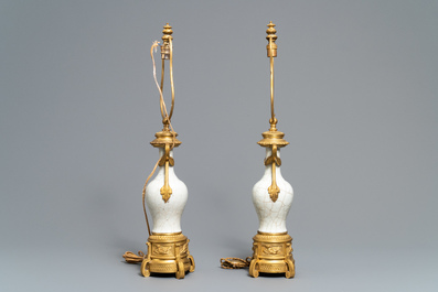 A pair of Chinese gilt bronze-mounted crackle-glazed vases, 18th C.