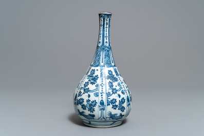 A Chinese blue and white bottle vase with flowers, Wanli