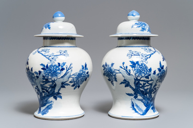 Two pairs of Chinese blue and white vases and covers, Kangxi and Chenghua marks, 19th C.