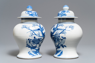 Two pairs of Chinese blue and white vases and covers, Kangxi and Chenghua marks, 19th C.