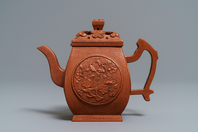 A Chinese Yixing stoneware teapot and cover, Jingxi Hua Feng Xiang Zhi mark, 18/19th C.