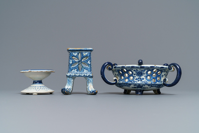 A Dutch Delft blue and white salt, a reticulated stand and a chafing dish, 18th C.