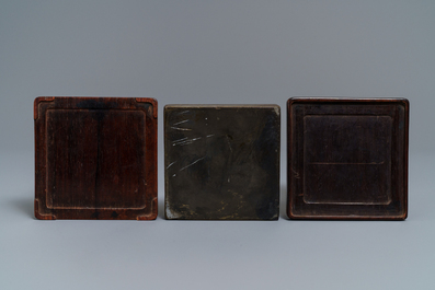 A square Chinese inscribed wood-encased duan inkstone, 19/20th C.