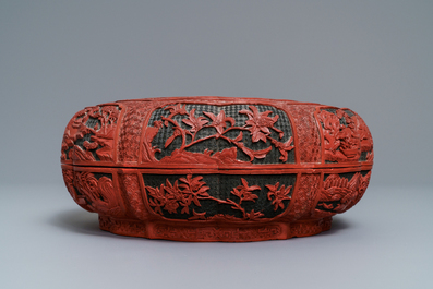 A Chinese cinnabar lacquer box and cover with figures in a landscape, 19th C.