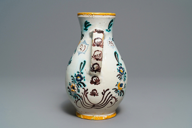 A Habaner pottery 'Holy Trinity' jug, Slovakia, dated 1820