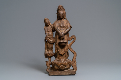 A Chinese carved stone 'Guanyin and attendant' group, Ming/Qing