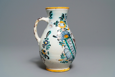 A Habaner pottery 'Holy Trinity' jug, Slovakia, dated 1820