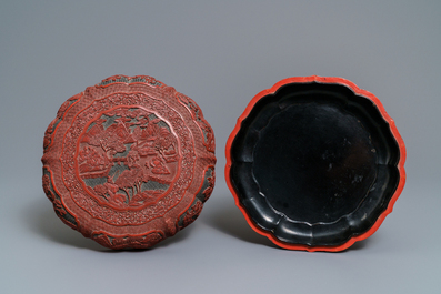 A Chinese cinnabar lacquer box and cover with figures in a landscape, 19th C.