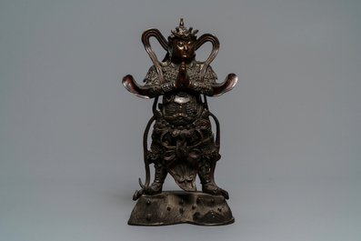 A Chinese gilt-lacquered bronze figure of Weituo, Ming