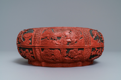 A Chinese cinnabar lacquer box and cover with figures in a landscape, 19th C.