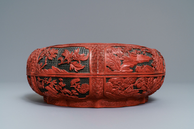 A Chinese cinnabar lacquer box and cover with figures in a landscape, 19th C.