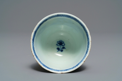 Five Chinese blue and white floral cups and saucers, Kangxi
