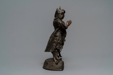 A Chinese gilt-lacquered bronze figure of Weituo, Ming