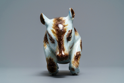 A polychrome Dutch Delft model of a bear, 18th C.