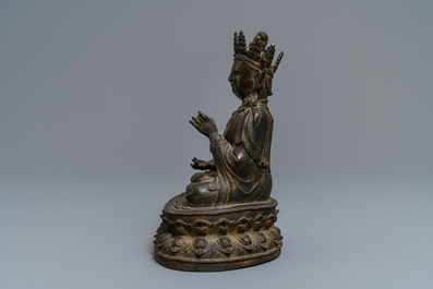 A Chinese bronze figure of Buddha, Ming