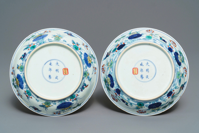 A pair of Chinese doucai 'ducks and lotus pond' plates, Chenghua mark, 18th C.